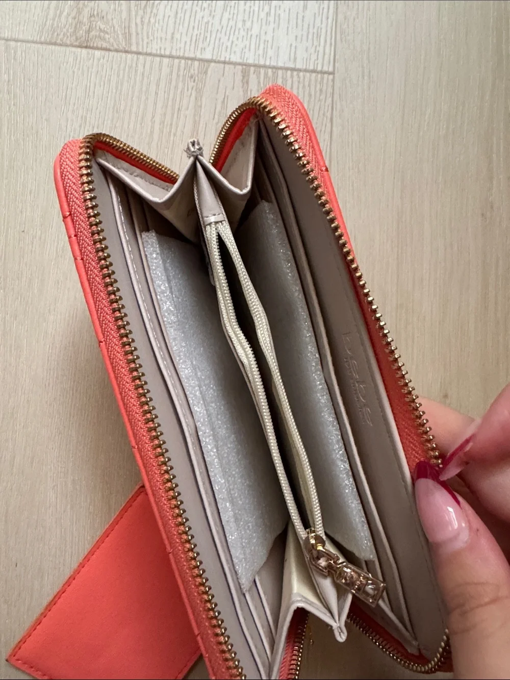 bebe Coral Quilted Wristlet Clutch with Gold Logo